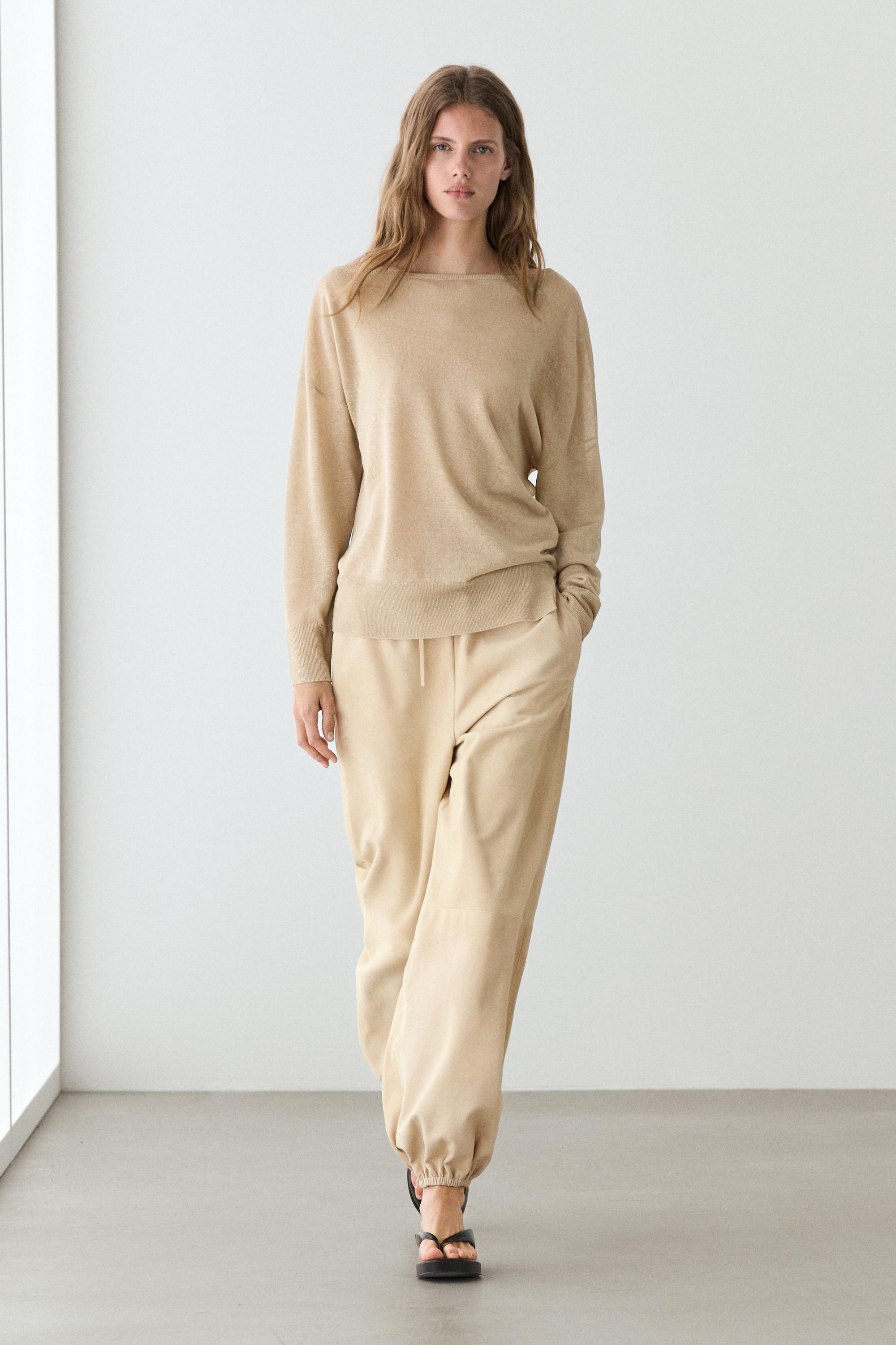 Flowing 100% linen off-the-shoulder sweater